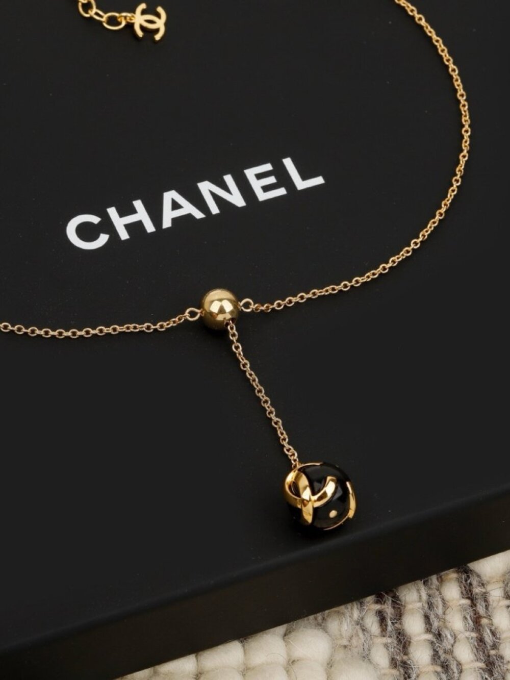 Chanel Gold-Tone Black Enamel Ball CC Pendant Necklace